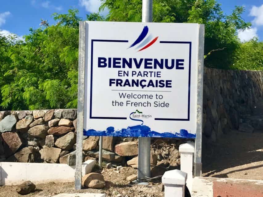 The Welcome to the French Side sign at the border between Sint Maarten and Saint-Martin